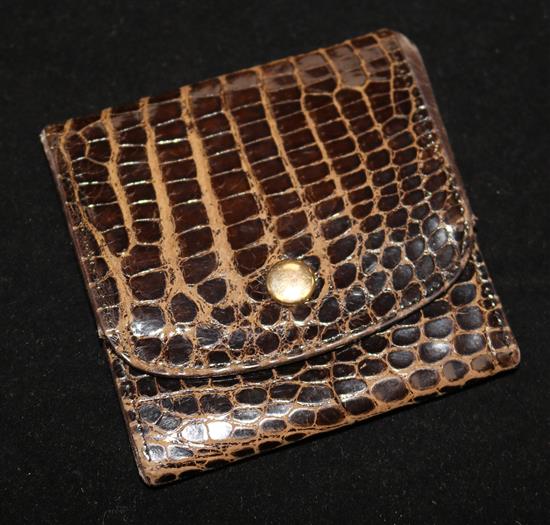 A small leather crocodile skin purse with Gucci label, 8cm sq.